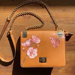 Hand painted acrylic cross body purse.